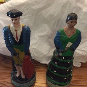 Colorful hand painted very old wine bottles from Spain.